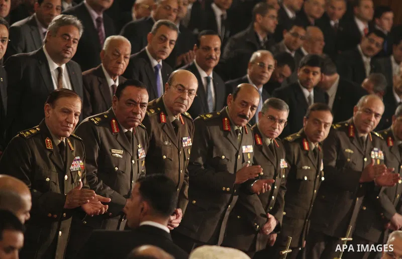 Egyptian potential presidential candidate Ahmed Shafik and General Sami Anan , Army chief of Staff and member of the SCAF at the Supreme Council of the Armed Forces, and other high-ranking military officials attend the C...