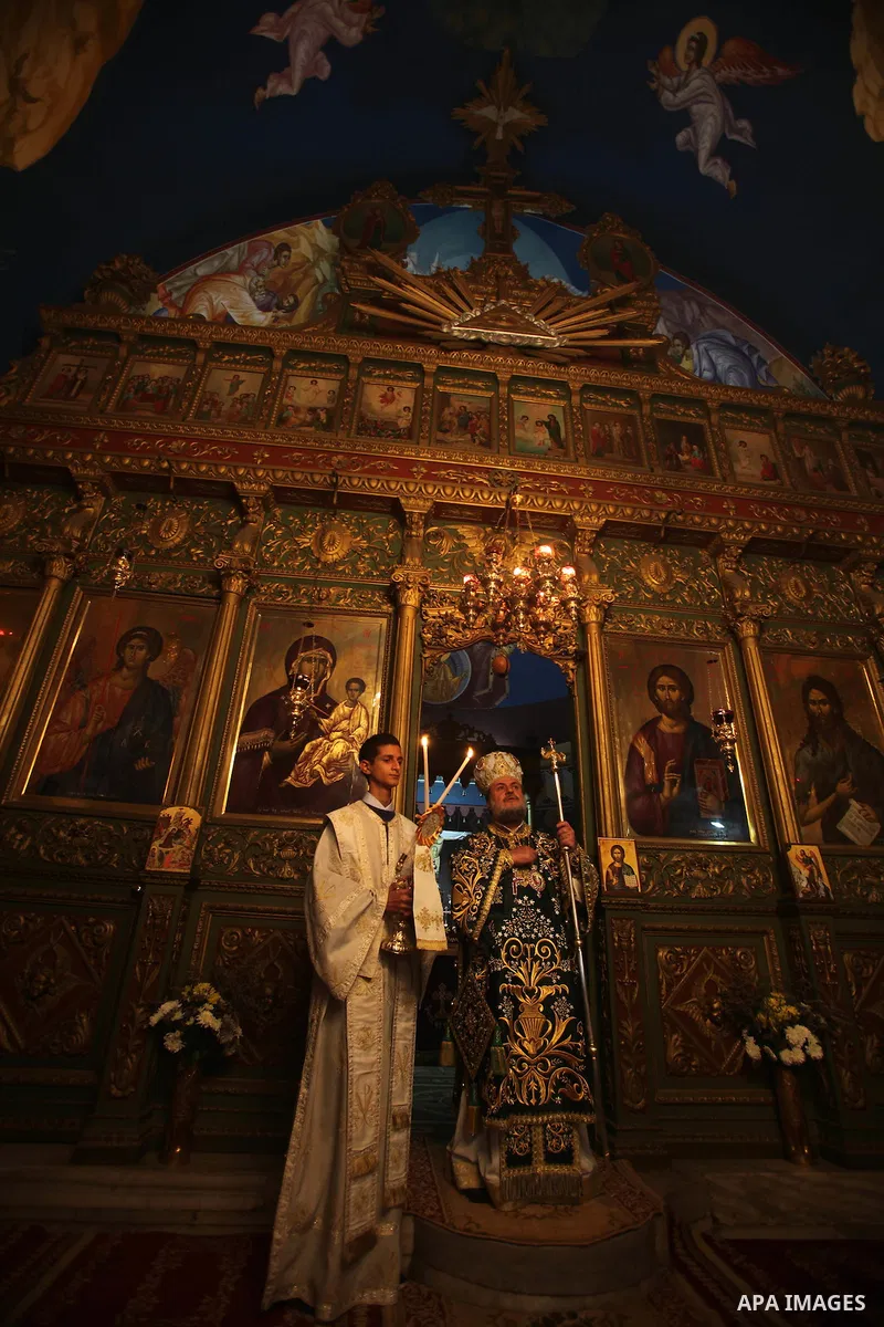 A Greek Orthodox priest attend Christmas services at the Saint Porfirios church in Gaza City January 7, 2012. Photo by Ashraf Amra