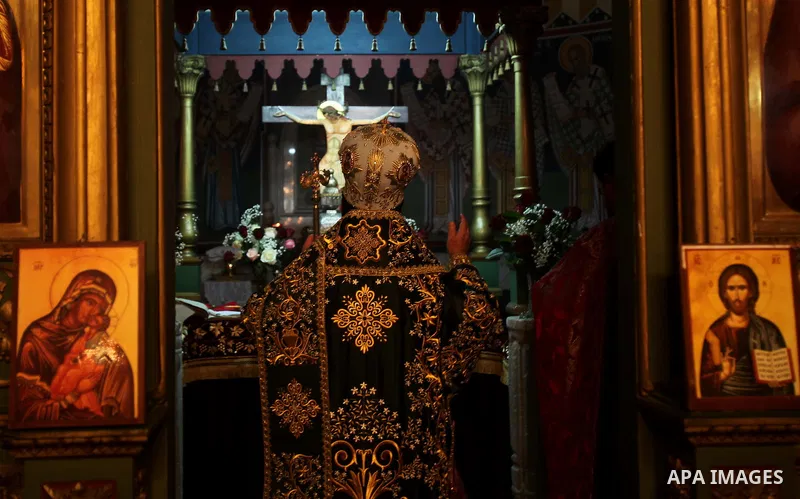 A Greek Orthodox priest attend Christmas services at the Saint Porfirios church in Gaza City January 7, 2012. Photo by Ashraf Amra