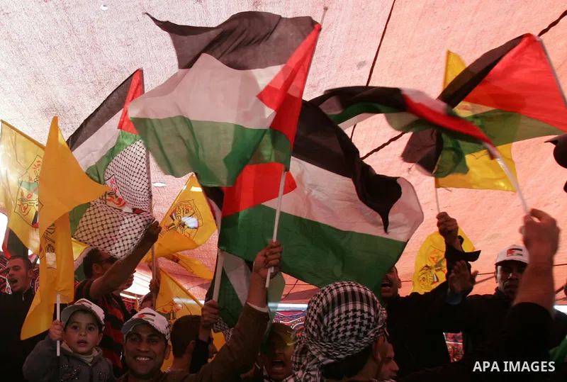 Palestinian Supporters of Fatah movement during a celebration to mark the 47th anniversary of the Fatah political movement, in sour baher Village, in jerusalem, on Jan 07, 201. Photo by Mahfouz Abu Turk