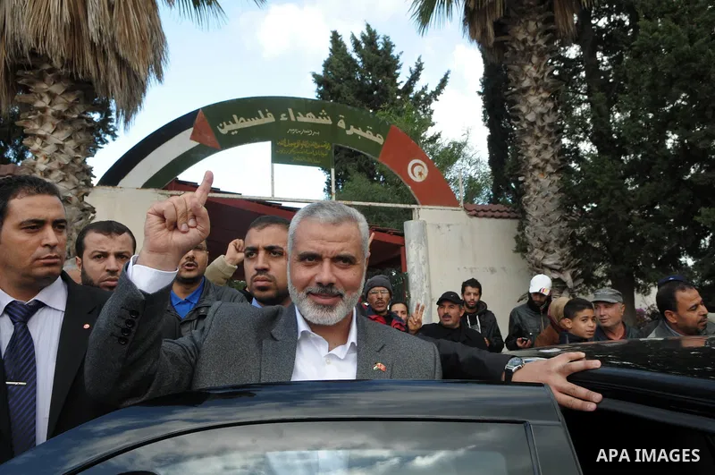 Palestinian Prime Minister in Gaza Strip, Ismail Haniyeh, during his visit to cemetery Palestine martyrs, in Tunisia on Jan. 08, 2012. Photo by Mohammed Al-Ostaz