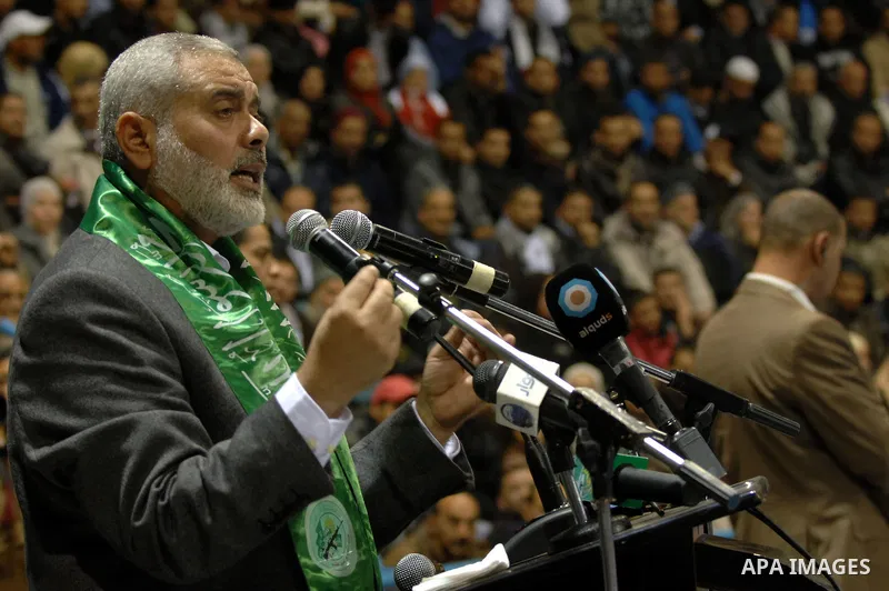 Ismail Haniya, prime minister in the Hamas-ruled Gaza Strip, gestures as he speaks in front of supporters of the Tunisian islamist Ennahdha Party on January 8, 2012 in Tunis. A visit by Gaza's Hamas leader has angered th...