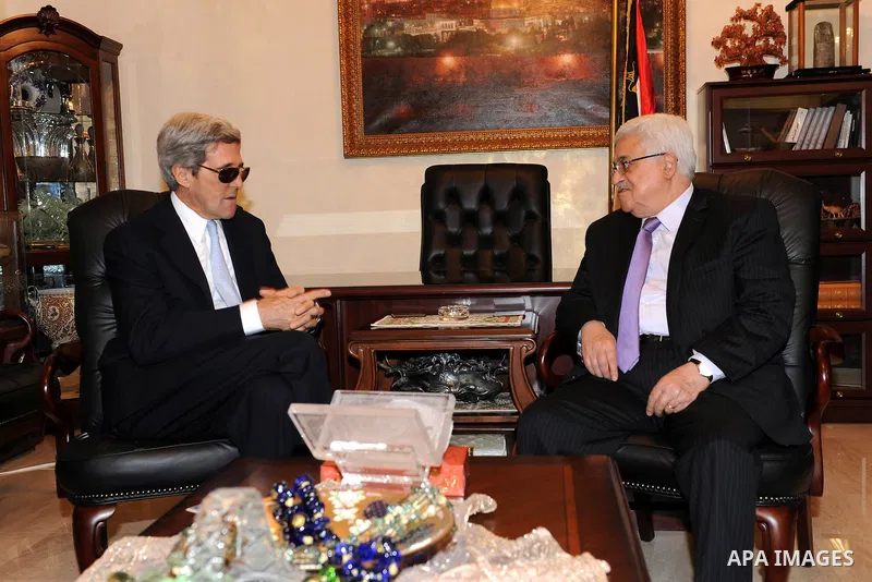Palestinian President Mahmoud Abbas (Abu Mazen), meets with Chairman of the Foreign Relations Committee, U.S. Congress, John Kerry, In Jordan On Jan. 10, 2012. Photo by Thaer Ganaim