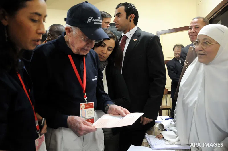 Jimmy Carter's at the Rod Farag School. During his presidency in the 1970s, Carter helped broker the Camp David Accords that led to a 1979 peace agreement between Israel and Egypt. -- Jimmy Carter's visit to the Committe...