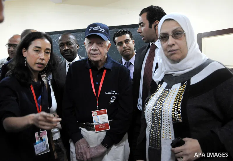 Jimmy Carter's at the Rod Farag School. During his presidency in the 1970s, Carter helped broker the Camp David Accords that led to a 1979 peace agreement between Israel and Egypt. -- Jimmy Carter's visit to the Committe...