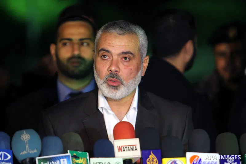Palestinian Prime Minister in Gaza Strip, Ismail Haniyeh, speaks during press conference while his arrival at Rafah Crossing in the southern Gaza Strip January 10, 2012. Haniyeh returned to Gaza on Tuesday after making a...