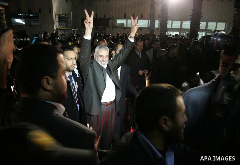 Palestinian Prime Minister in Gaza Strip, Ismail Haniyeh, during his arrival at Rafah Crossing in the southern Gaza Strip January 10, 2012. Haniyeh returned to Gaza on Tuesday after making a tour in which he visited Turk...