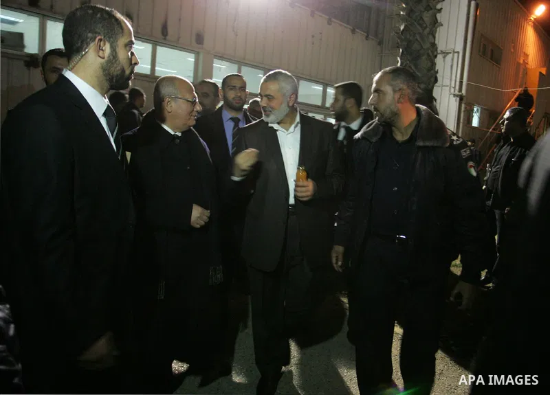 Palestinian Prime Minister in Gaza Strip, Ismail Haniyeh, during his arrival at Rafah Crossing in the southern Gaza Strip January 10, 2012. Haniyeh returned to Gaza on Tuesday after making a tour in which he visited Turk...