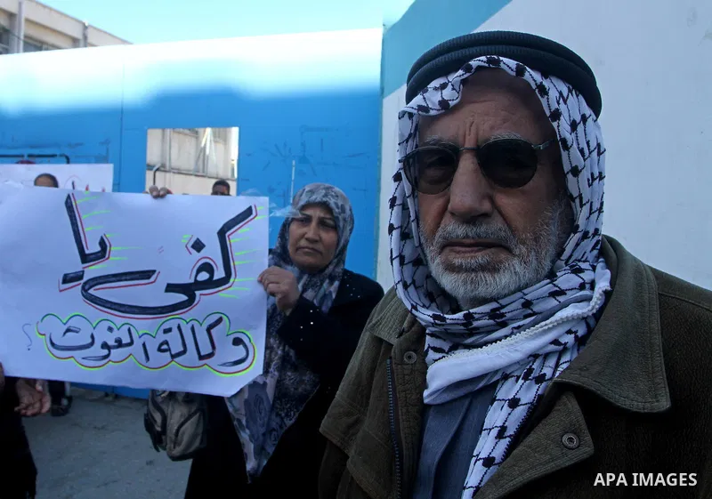 A Palestinians during a demonstration at an UNRWA (United Nations Relief and Works Agency for Palestine Refugees in the Near East) distribution center in Nusirat, central Gaza January 12, 2012. About 50 Palestinians gath...