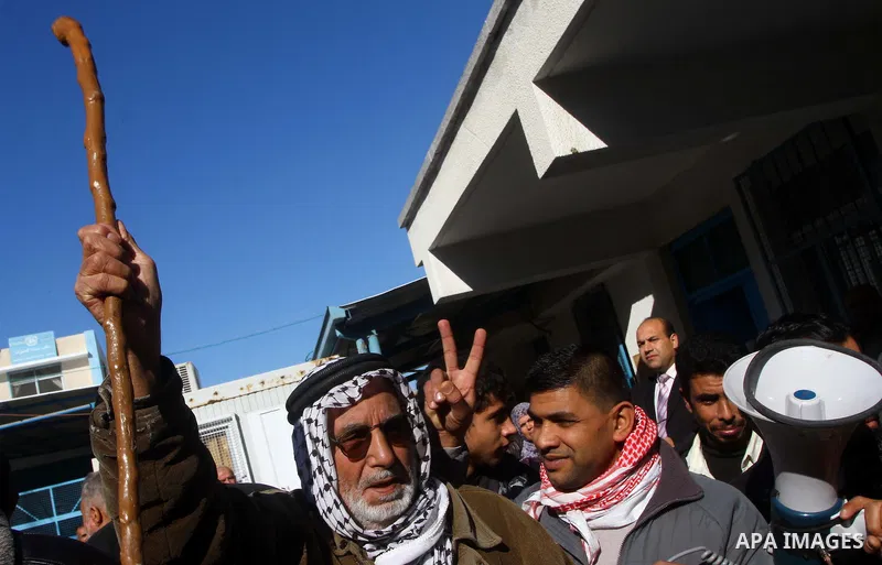 A Palestinians during a demonstration at an UNRWA (United Nations Relief and Works Agency for Palestine Refugees in the Near East) distribution center in Nusirat, central Gaza January 12, 2012. About 50 Palestinians gath...