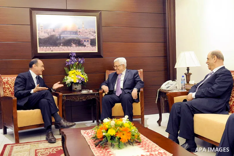 Palestinian President, Mahmoud Abbas (Abu Mazen), during a meeting with the Italian Consul General in Jerusalem, Luciano Bisota, in the West Bank city of Ramallah on Dec 26, 2011. Photo by Thaer Ghanaim