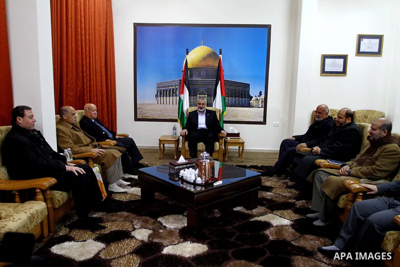 Palestinian Prime Minister in Gaza Strip, Ismail Haniyeh, meets with the leadership of Hamas and Fatah movment to discuss Palestinian reconciliation between the two groups in Gaza City, on Jan 14, 2012. 14, 2012. Photo b...