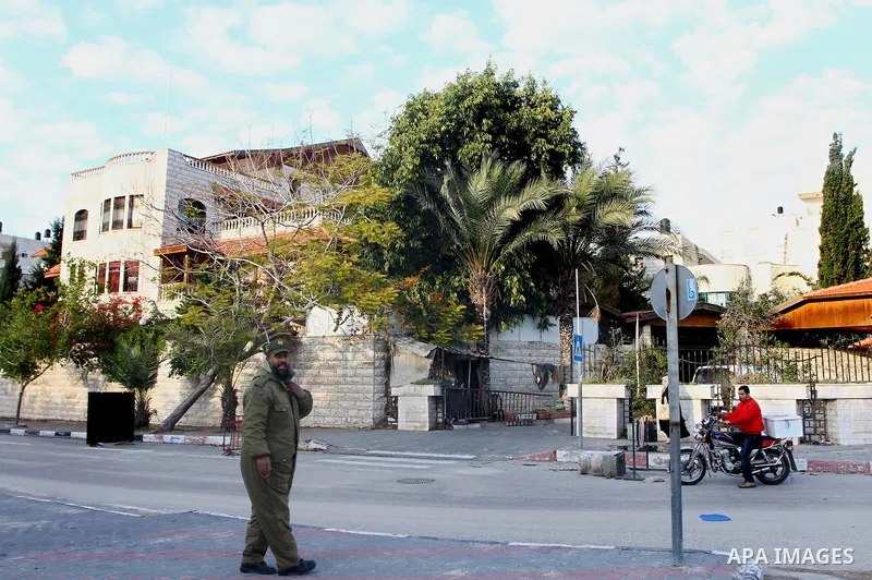 Palestinian security, Members of the Hamas movement now in control of the Gaza strip, stand next Palestinian president house in gaza City, on Jan 14, 2012. Palestinian Prime Minister in Gaza Strip, Ismail Haniyeh, said t...