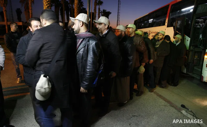A convoy of "Miles of Smiles 8" carrying medical aid to Gaza crosses the Rafah crossing into the southern Gaza Strip from Egypt on Jan 14, 2012. The convoy, carrying medical aid for the impoverished Palestinian territory...
