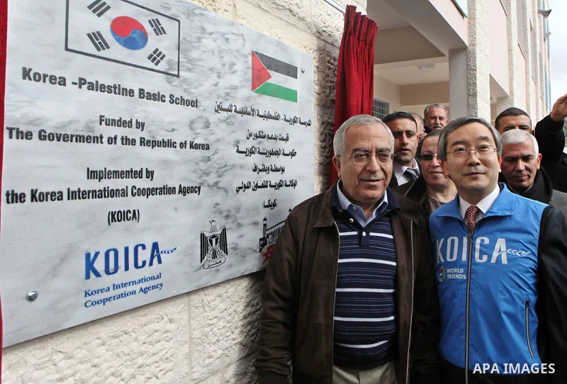 Palestinian Prime Minister, Salam Fayyad, during the opining "Korean Palestinian Center", and "School Korean Palestinian", in the West bank city of Hebron, Jan.14, 2012. Photo by Mustafa Abu Dayeh .