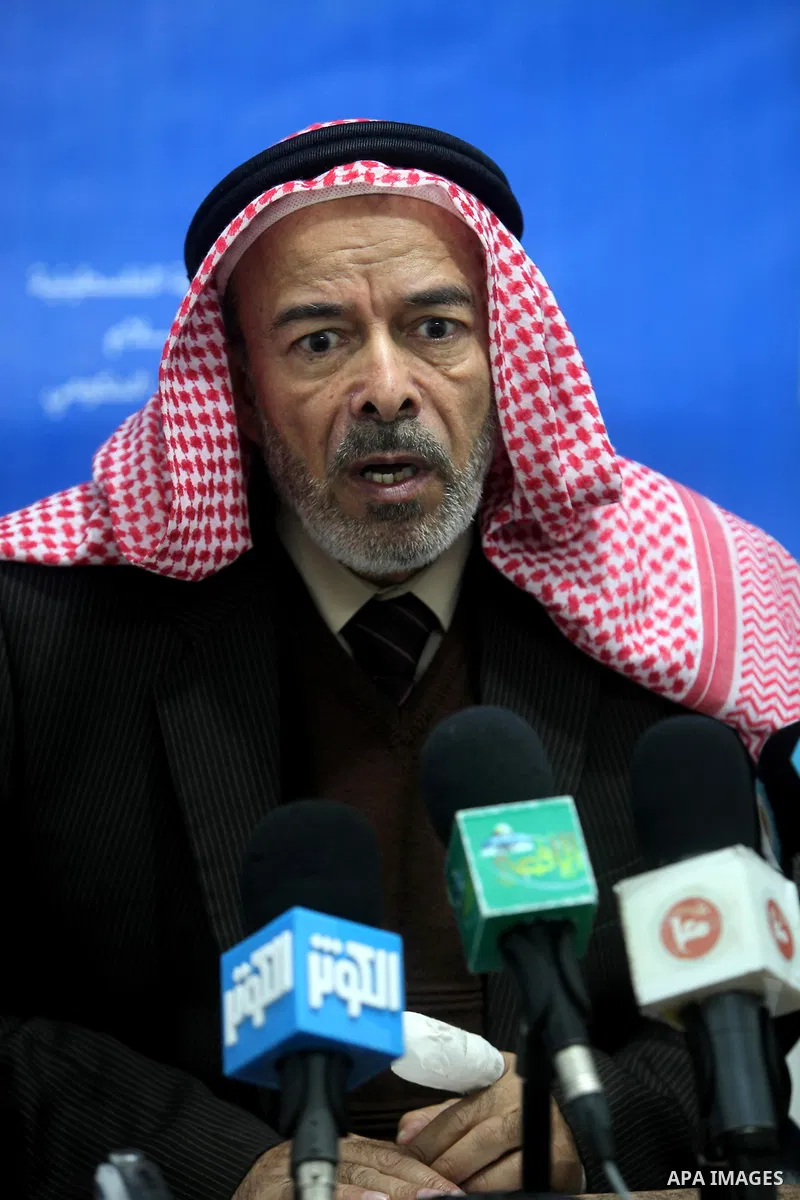 Palestinian media adviser for Prime Minister in Gaza Strip, Youssef Rizqa, delivers a speech during press conference in Gaza city on Jan. 15, 2012. Photo by Asharf Amra