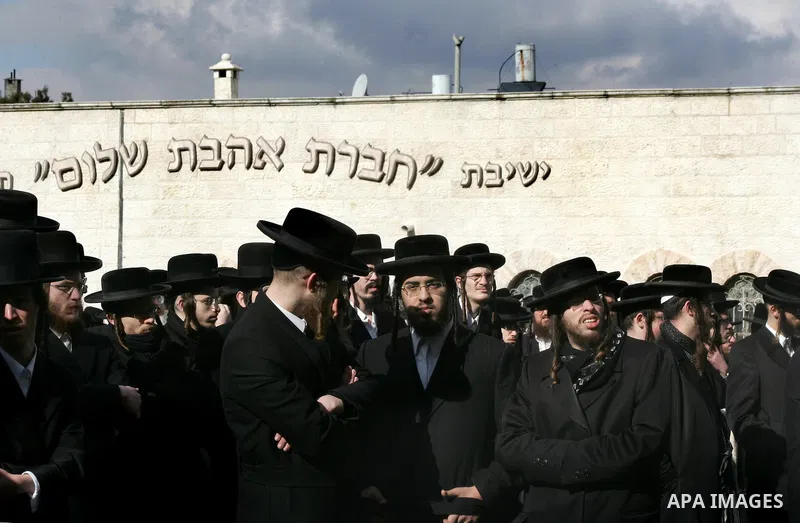Ultra Orthodox Jewish men attend a demonstration against the arrest of six Ultra Orthodox Jews suspected of tax evasion in the Meah Shearim Neighborhood, Jerusalem, 15 January 2012. Reports state that three men were arre...