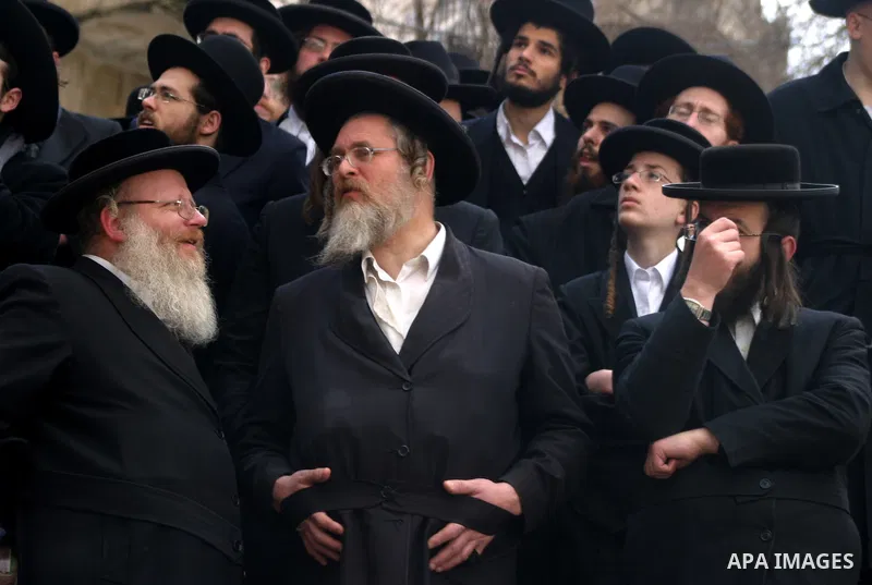 Ultra Orthodox Jewish men attend a demonstration against the arrest of six Ultra Orthodox Jews suspected of tax evasion in the Meah Shearim Neighborhood, Jerusalem, 15 January 2012. Reports state that three men were arre...