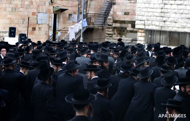 Ultra Orthodox Jewish men attend a demonstration against the arrest of six Ultra Orthodox Jews suspected of tax evasion in the Meah Shearim Neighborhood, Jerusalem, 15 January 2012. Reports state that three men were arre...