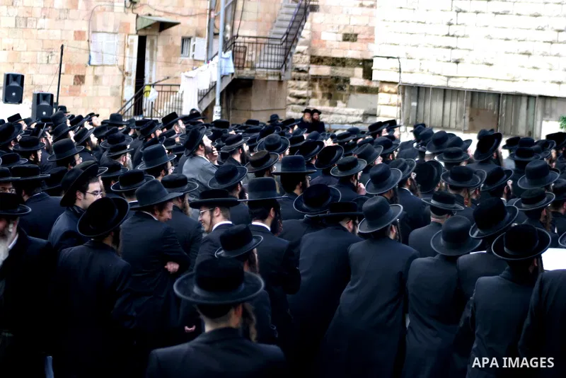 Ultra Orthodox Jewish men attend a demonstration against the arrest of six Ultra Orthodox Jews suspected of tax evasion in the Meah Shearim Neighborhood, Jerusalem, 15 January 2012. Reports state that three men were arre...