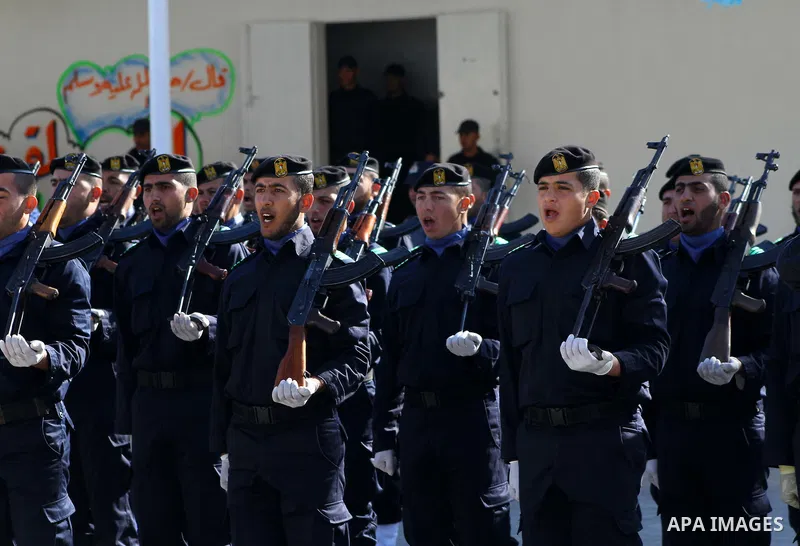 Palestinian members of Hamas security forces stand in formation during a graduation ceremony in Gaza City on Jan. 16, 2012. Photo by Ashraf Amra