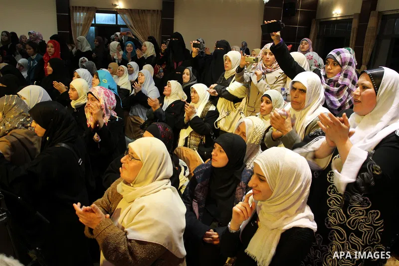 Palestinians attend a mass wedding organized by Waed Association for around 50 released Palestinian prisoners in Gaza city on January 17, 2012. Israel freed 550 Palestinian prisoners on December 19, 2011, completing the...