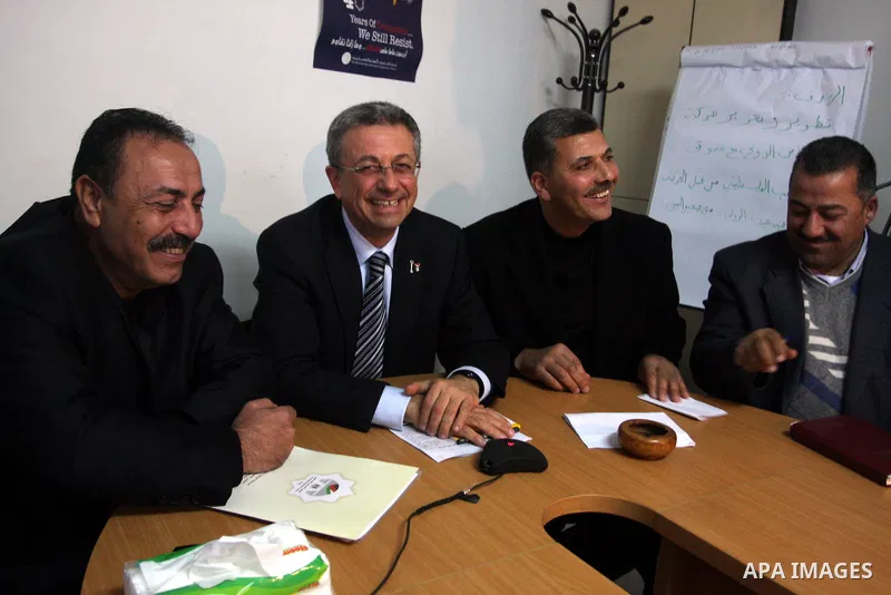 Palestinian Legislator Mustafa Barghouti,Fatah lawmaker Jamal Abu al-Roub, former deputy prime minister in the Hamas government, Nasser al-Shaer and others attend the meeting of the Freedoms Committee to end the division...