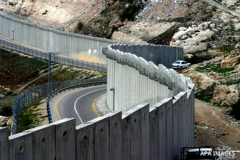 A view shows a section of Israel's controversial concrete barrier that separates the West Bank from Jerusalem on Jan.18, 2012. in Abu Dis, in Israeli-annexed east Jerusalem. Photo by Mahfouz Abu Turk