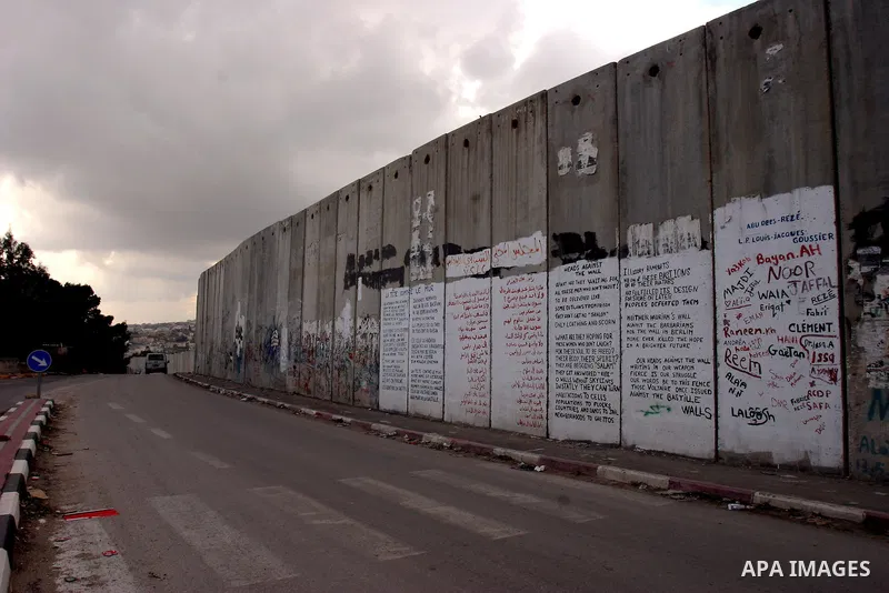 A view shows a section of Israel's controversial concrete barrier that separates the West Bank from Jerusalem on Jan.18, 2012. in Abu Dis, in Israeli-annexed east Jerusalem. Photo by Mahfouz Abu Turk