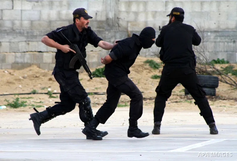 Palestinian members of Hamas security forces take part in a graduation ceremony for special security forces in Gaza City, Thursday, Jan. 19, 2012. Photo by Ashraf Amra