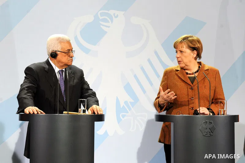 Palestinian president Mahmud Abbas meets with the German chancellor Angela Merkel at the Chancellery in Berlin on January 19, 2012. Photo by Thaer Ganaim