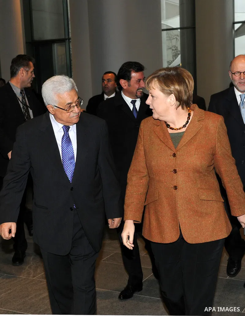 Palestinian president Mahmud Abbas meets with the German chancellor Angela Merkel at the Chancellery in Berlin on January 19, 2012. Photo by Thaer Ganaim