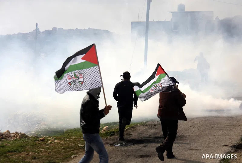 Israeli border officers clash with Palestinian demonstrators during a protest in the village of Kufr Qaddum, near the Israeli settlement of Kdumim, in the northern West Bank, Friday, Jan. 20, 2012. Photo by Wagdi Eshtaya...