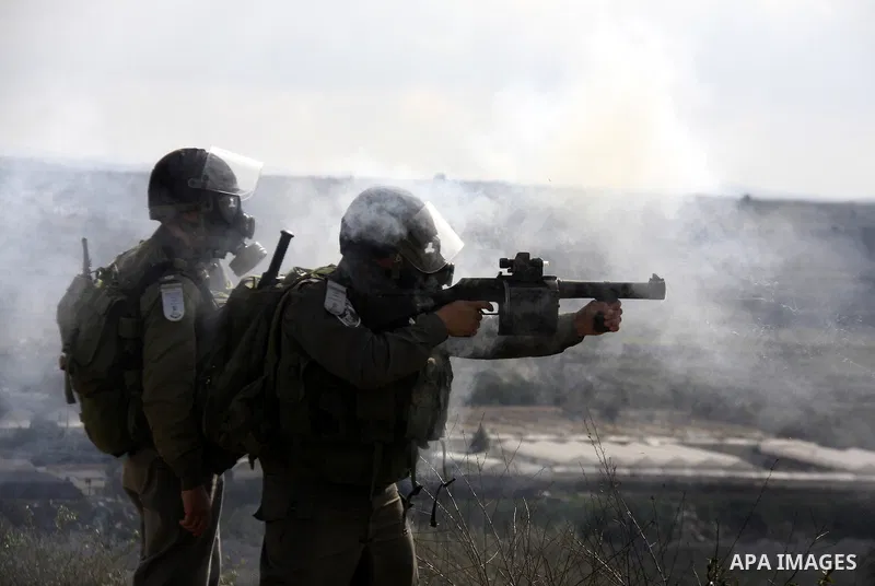 Israeli border officers clash with Palestinian demonstrators during a protest in the village of Kufr Qaddum, near the Israeli settlement of Kdumim, in the northern West Bank, Friday, Jan. 20, 2012. Photo by Wagdi Eshtaya...