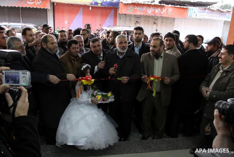 Palestinian Prime Minister in Gaza Strip, Ismail Haniya attends the opening ceremony of a commercial centre inside al-Shejaia club in Gaza city on January 20, 2012. Photo by Mohammed Asad