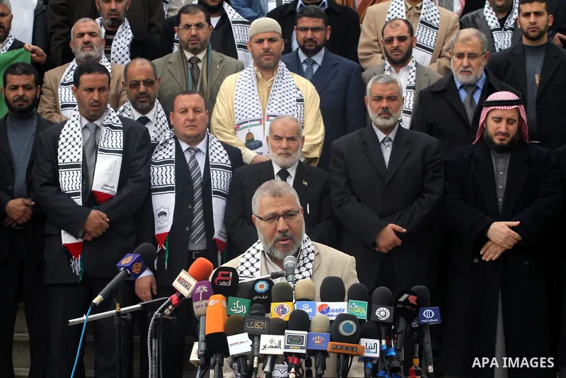 Palestinian Legislative Council members participate in a press conference during a protest in Gaza City on January 21, 2012 in solidarity with Palestinian parliamentary speaker and Hamas member Aziz Dweik, who was arrest...