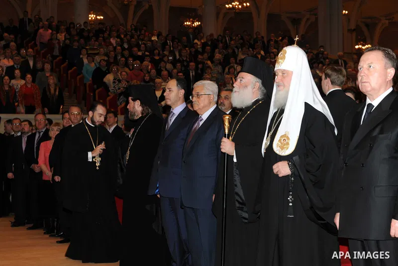 Palestinian President Mahmoud Abbas (Abu Mazen) receives the award of the late Alexei II from the Patriarch of Moscow and all Russia Patriarch Kirill I, in Moscow, on Jan. 21, 2012. Photo by Thaer Ganaim