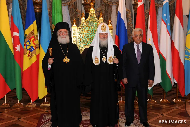 Palestinian President Mahmoud Abbas (Abu Mazen) receives the award of the late Alexei II from the Patriarch of Moscow and all Russia Patriarch Kirill I, in Moscow, on Jan. 21, 2012. Photo by Thaer Ganaim