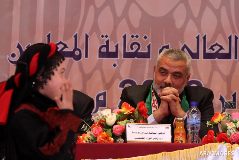 Palestinian Prime Minister in Gaza Strip, Ismail Haniyah attends a celebration in the ocassion of Teacher's Day, in Gaza city on Jan. 22, 2012. Photo by Mohammed Asad