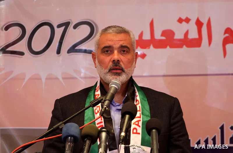 Palestinian Prime Minister in Gaza Strip, Ismail Haniyah attends a celebration in the ocassion of Teacher's Day, in Gaza city on Jan. 22, 2012. Photo by Mohammed Asad