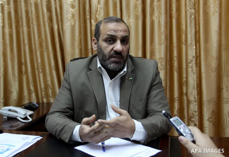 Palestinian Youth and Sport Minister, Mohammed al-Madhoun speaks to media at his office, in Gaza city on Jan. 22, 2012. Photo by Mohammed Asad