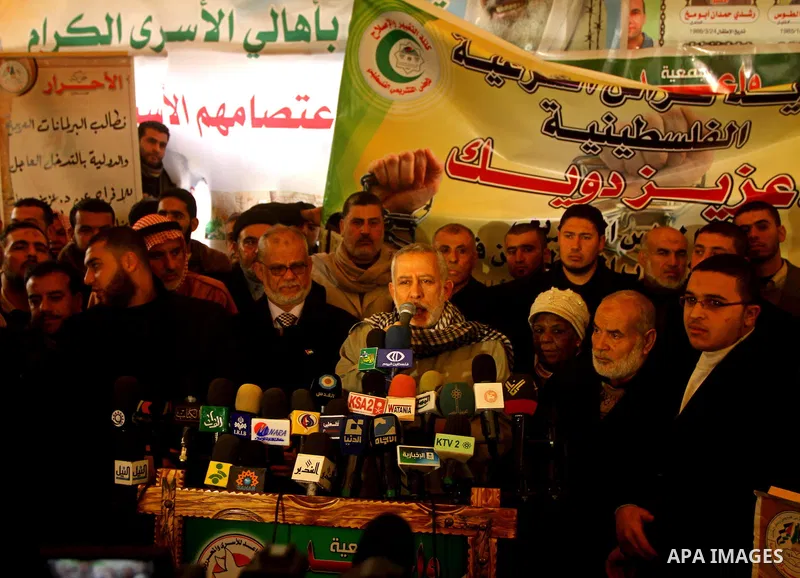 leader in the islamic jihad movement, Mohammed AL_Hindi, delivers a speech during in a weekly activity calling for their liberty at the Red Cross headquarters in Gaza City, on Jan. 23, 2012. Photo by Ashraf Amra