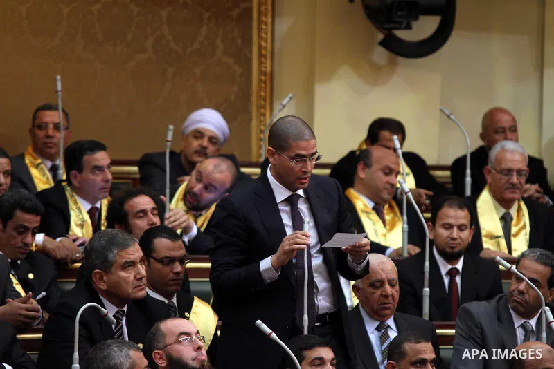 Egyptian parliament members attend the first parliament session after the revolution that ousted former President Hosni Mubarak, in Cairo January 23, 2012. Egypt's parliament began its first session on Monday since an el...