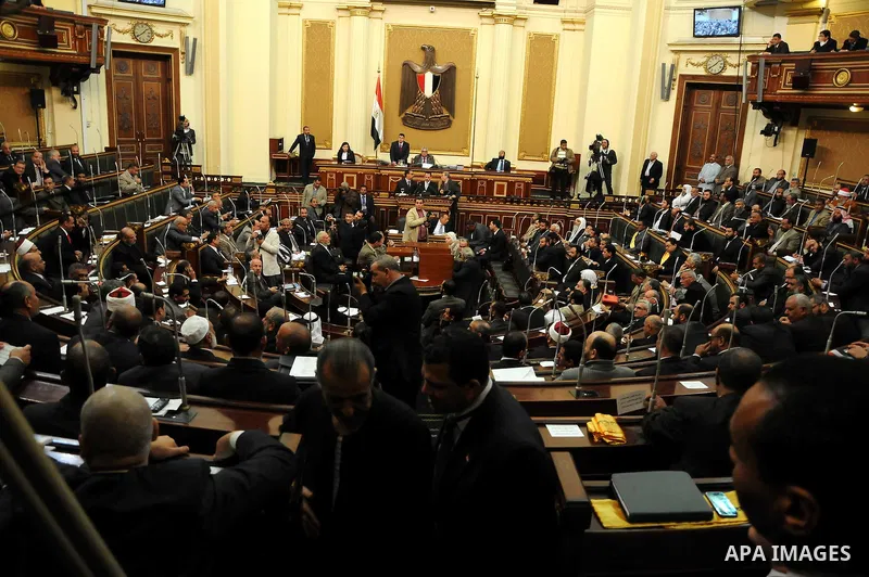 Egyptian parliament members attend the first parliament session after the revolution that ousted former President Hosni Mubarak, in Cairo January 23, 2012. Egypt's parliament began its first session on Monday since an el...