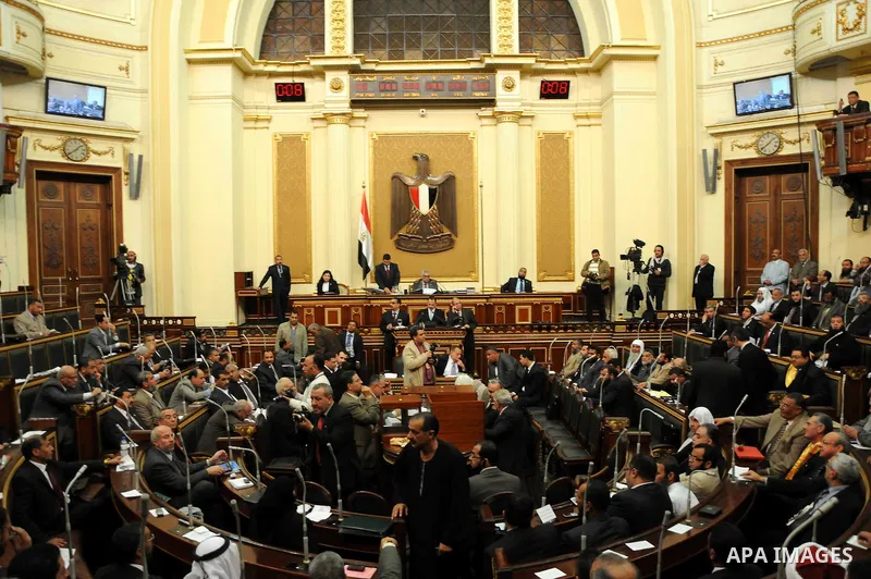 Egyptian parliament members attend the first parliament session after the revolution that ousted former President Hosni Mubarak, in Cairo January 23, 2012. Egypt's parliament began its first session on Monday since an el...