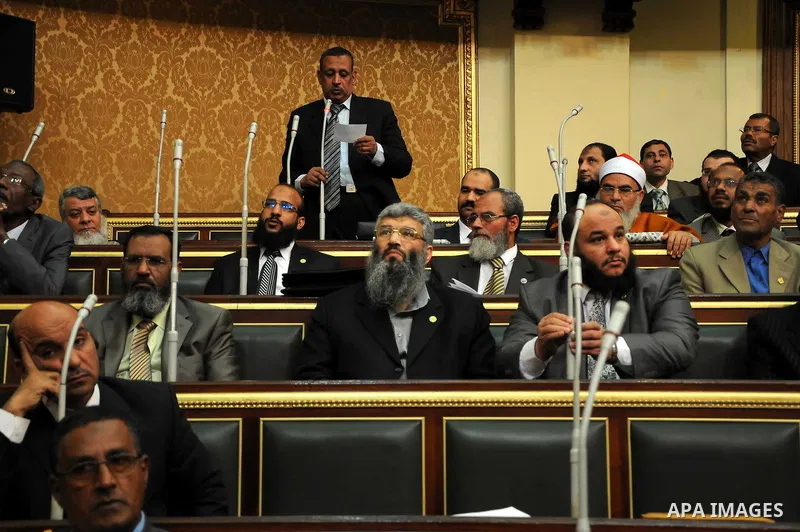 Egyptian parliament members attend the first parliament session after the revolution that ousted former President Hosni Mubarak, in Cairo January 23, 2012. Egypt's parliament began its first session on Monday since an el...