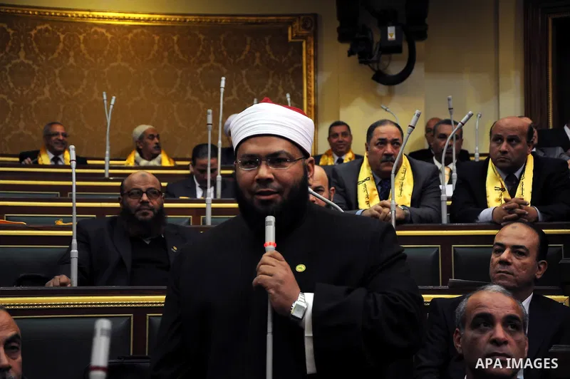 Egyptian parliament members attend the first parliament session after the revolution that ousted former President Hosni Mubarak, in Cairo January 23, 2012. Egypt's parliament began its first session on Monday since an el...