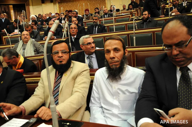 Egyptian parliament members attend the first parliament session after the revolution that ousted former President Hosni Mubarak, in Cairo January 23, 2012. Egypt's parliament began its first session on Monday since an el...
