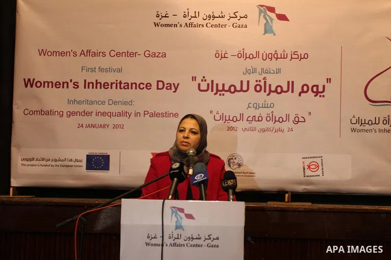A Palestinian woman speaks during a celebration organized by Women's Affairs Centre in the occasion of the Women's Inheritance Day at al-Shawwa theatre, in Gaza City, on Jan. 24, 2012. Photo by Mohammed Asad