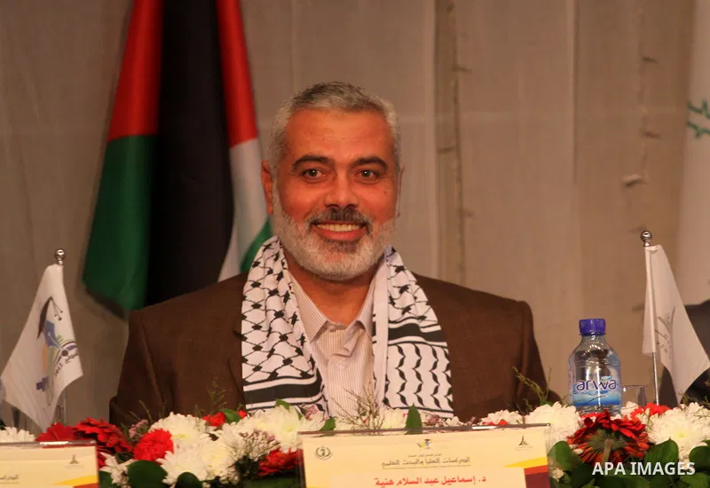 Palestinian Prime Minister in Gaza Strip, Ismail Haniya receives 40 dean of different of the universitys Arab countries during academic conference in Gaza city, on Jan. 24, 2012 . photo by Mohammed Asad